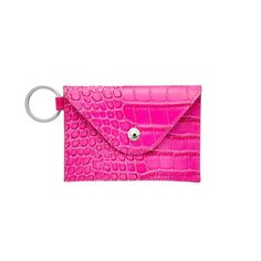 a pink wallet with a keychain attached to it