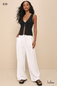 You'll nail your look every time with ease when you have the Lulus Effortlessly Sophisticated Ivory Wide-Leg Trouser Pants! Lightweight woven cotton, with a linen-like feel, shapes these on-trend pants with a high-waisted silhouette, belt loops, and a hidden zip fly with a top button closure. Diagonal front pockets and pleated details accent the wide pant legs that fall to ankle-length hems. Functional welt pockets at back complete the casually chic look! Fit: This garment fits true to size. Len Trend Pants, Casually Chic, Sophisticated Outfits, Casual Wedding Dress, Pants Large, Weekend Style, Wide Pants, Woven Cotton