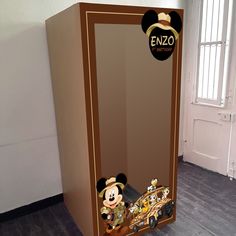 a cardboard box with an image of mickey mouse on it