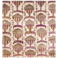 an area rug with various designs and colors on the ground, including pinks, browns,