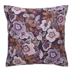 a purple pillow with flowers on it