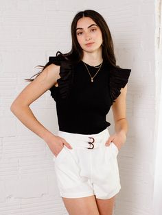 These shorts from Bishop & Young are the perfect way to add a dressy touch to any and every look! These flowy + soft woven shorts feature a unique double button detail across the waistband to highlight the high rise cut of these shorts. Perfect to pair back to a mix and match blazer look for an ultra street chic look, or give them a more casual flair with a woven tank + wedge sandal for an easy going, summer style! 50% Rayon, 50% Tencel Rise: 13" Inseam: 2" Model is wearing a S. Blazer Look, Easy Going, Street Chic, Wedge Sandal, Mix N Match, Button Detail, Mix And Match, Summer Style, Wedge Sandals