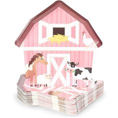 a pink barn with horses and cows on it's roof is set against a white background