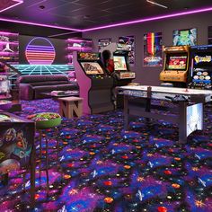 a brightly lit room with arcade machines and video games on the walls, carpeted in purple