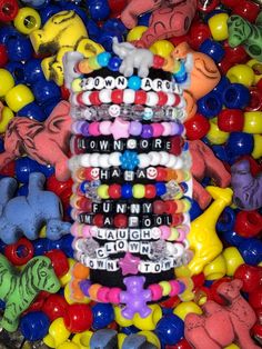 Clown-core Themed Kandi Beaded Bracelets You'll receive 10 randomly selected clowncore themed bracelets These bracelets will come in a variety of adult sizes We make our Kandi bracelets using stretch string We're here to make the sweetest kandi for you !! ☮️❤️🍬 Novelty Bracelets With Letter Beads, Fun Black Friendship Bracelets, Multicolor Themed Friendship Bracelets, Novelty Adjustable Charm Bracelet, Fun Beaded Letter Bracelets For Party Favors, Fun Beaded Bracelets For Party Favors, Fun Beaded Bracelets With Letter Beads For Party Favors, Multicolor Themed Beaded Bracelets For Friendship, Fun White Beaded Bracelets For Party Favors