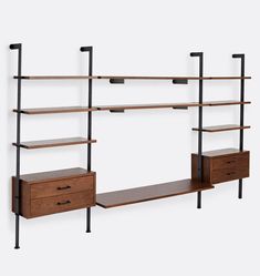 three wooden shelves and two metal shelving units