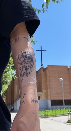 a person with a tattoo on their arm