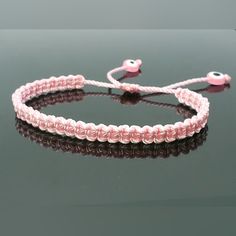 Fashionable And Durable Handmade Pink String Bracelet With Two Pink Evil Eyes For Wrist Sizes From 6 To 9 In. With An Easy To Use Zip Like Function To Fit Your Wrist, You'll Have It On As Soon As You Get It. Made From High Quality Pink String, It Will Be Sure To Last. These Bracelets Are Worn To Attract Good Fortune, Bring A Good Mood And Ward Off Bad Vibes. The Evil Eye Meaning Has Symbolism In Almost Every Country In The World And In Every Religion. Each Bracelet Is Carefully Handcrafted And G Casual Wristband As Gift, Adjustable Wristband For Friendship, Pink Adjustable Band Bracelet As Gift, Pink Adjustable Band Bracelet For Gift, Trendy Pink Bracelet With Adjustable Length, Trendy Pink Adjustable Bracelet, Pink Adjustable Friendship Bracelet, Trendy Pink Adjustable-length Bracelet, Casual Pink Bracelets With Adjustable Length