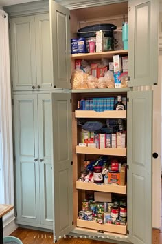 an open pantry with lots of food on shelves and cupboards in the corner,