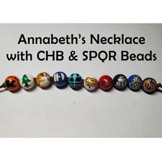 a row of beads with the words anabeth's necklace with chb & spqr beads