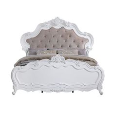 a white bed with an upholstered headboard and foot board is shown against a white background