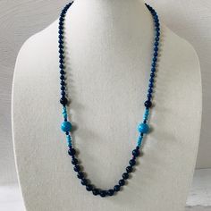 Vintage Lapis Lazuli Azurite Turquoise Long Beaded Necklace 28in Gorgeous Colors! It is composed of lapis lazuli, turquoise, and azurite round beads with small stations of turquoise pebbles for interest. This necklace is 28" long and has no clasp, and it slips over the head. The beads at the front center are 8 mm, followed by the small pebbles. The large turquoise rounds are 13.5 mm in diameter and flanked by 4mm round lapis beads. Above those, there is a 10mm round lapis bead on each side. The Long Beaded Necklace, Lapis Lazuli, Round Beads, Shades Of Blue, Beaded Necklace, Turquoise, Beads, Color