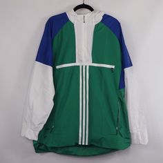 Adidas Spell Out Color Block Anorak Jacket Jacket New Blue, Green And White The Size Is Xl Measurements Are: 31 Inches Underarm To Underarm 34 Inches Top To Bottom Polyester Check Out My Other Items For Sale In My Store! K134 Adidas Windbreaker With Pockets For Spring, Adidas Spring Windbreaker With Pockets, Spring Adidas Outdoor Outerwear, Adidas Spring Outdoor Outerwear, Adidas Outdoor Outerwear For Spring, Green Adidas Winter Track Jacket, Adidas Green Winter Track Jacket, Winter Adidas Green Track Jacket, Adidas Green Outerwear For Winter