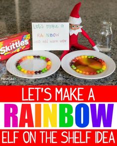 an elf is sitting next to two plates with candy on them and a sign that says let's make a rainbow selfie on the shelf