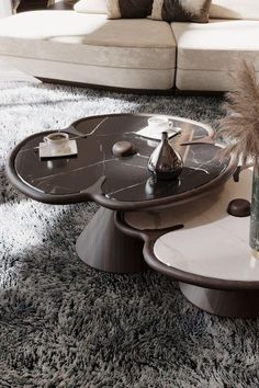 a modern coffee table in the middle of a living room