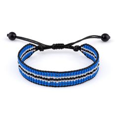 Flaunt your love for Botswana with this stylish and adjustable rope bracelet. Crafted with intricate threading techniques, this boho-chic accessory features the iconic blue, black, and white stripes of the Botswana flag. Perfect for both women and men, this versatile bracelet can be easily adjusted to fit most wrist sizes, making it a comfortable and fashionable addition to your everyday look. Whether youre a proud Botswana native or simply appreciate the countrys vibrant culture, this bracelet is a subtle yet meaningful way to showcase your connection. Measuring approximately 6-8 inches (15-20 cm) in circumference, this durable and lightweight bracelet is ideal for casual or semi-formal occasions. Embrace the spirit of Botswana with this eye-catching accessory. Adjustable Waxed Cord Beaded Bracelets For Friendship, Bohemian Beaded Bracelets With Nylon Cord For Beach, Adjustable Cord Friendship Bracelets For Festival, Bohemian Beaded Bracelets With Resizable Nylon Cord, Resizable Bohemian Beaded Bracelets With Nylon Cord, Bohemian Nylon Cord Bracelet As Gift, Resizable Beaded Bracelets With Waxed Cord For Festivals, Adjustable Waxed Cord Friendship Bracelets For Festivals, Adjustable Bohemian Braided Bracelets With Nylon Cord