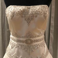 a wedding dress on display in a store