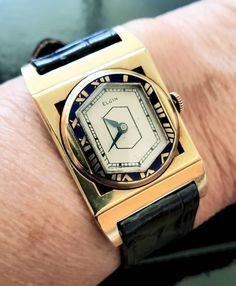 Hi , This incredible 14k Art Deco wristwatch is from my personal collection! I have the same in 14k white gold too ! ( for sale too ) I love this mechanical wind up Elgin presentation watch ⌚  Blue enamel on the bezel with a solid 14k yellow gold case . The hinged lugs make it fit even better! The roman numerals are in great shape  easy to read . The dial is great but not perfect. In working order , keeps time . Must wind up every few days Add this to your collection cause it's original and fabulous! Will need a tune up / cleaning at some point.