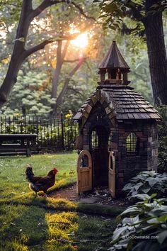 there is a chicken in the yard next to a small building with a bell on top