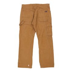 Vintage Dickies brown carpenter trousers, fit a 37" waist and 31" inseam. WAIST: 37 inches / 94cmsINSEAM: 31 inches / 79cmsRISE: 12 inches / 30cmsGENDER: mens CONDITION: good - faint marks on back.STYLE: carpenter trousersERA: 1990sCOLOUR: brownFABRIC: cotton Full Length Brown Cargo Pants, Brown Full Length Cargo Pants, Brown Cotton Pants With Multiple Pockets, Brown Cotton Jeans With Belt Loops, Brown Straight Leg Cargo Pants With Patch Pockets, Brown Utility Bottoms For Workwear, Brown Workwear Jeans With Belt Loops, Brown Relaxed Fit Cargo Jeans For Fall, Brown Wide Leg Utility Pants