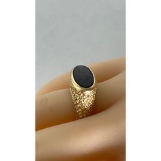 Add a touch of vintage elegance to your collection with this stunning men's ring. Expertly crafted from 14k yellow gold, this exquisite piece features a bezel-set black onyx cabochon, perfectly sized at 9mm x 18mm. The rich, deep black of the onyx is beautifully complemented by the warm glow of the gold. Key Features: Material: 14k Yellow Gold Gemstone: Black Onyx Cabochon Gemstone Size: 9mm x 18mm Ring Size: 8 Ring Face Width: 11.7mm Total Weight: 10.4 grams Design: Textured Shank Markings: Stamped "14k" Details: Timeless Design: The vintage styling of this ring offers a classic look that never goes out of fashion. Quality Craftsmanship: Made from high-quality 14k yellow gold, ensuring durability and lasting beauty. Comfort Fit: Sized at 8, this ring provides a comfortable fit for everyda Ruby Solitaire Ring, Gemstone Solitaire Ring, Sapphire Solitaire Ring, Vintage Styling, Gold Key, White Gold Solitaire, Gold Solitaire Ring, Sapphire Solitaire, Contemporary Ring