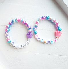 These super cute personalized bracelets are the perfect gift for any little girl who loves pretty jewelry! *Small beads not intended for Children 3 and under. Always supervise Children with bracelets. How to order 1) Select a Size 2)Select a Style  3)Add personalization Childrens Beaded Jewelry, Princess Seed Bead Bracelet, Beaded Bracelets For Children, Beaded Jewelry For Kids, Barbie Jewelry For Women, Kids Bracelets Diy, Beaded Bracelets For Kids, Kids Beaded Bracelets, Kid Bracelets