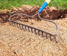 a garden tool digging in the sand