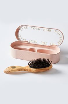 What it is: A natural hair and scalp care tool with 100% boar bristles, specially developed to nourish and protect thick or curly hair. The petite brush size is perfect to accompany you daily or on your travels.Who it's for: Ideal for thick and curly hair types.What it does: The brush features a bristle application and design for thick or curly hair. Finally, a boar bristle brush without nylon tips that delivers maximum results. Boar bristles are the only fiber capable of providing real benefits Boar Bristle Brush, Curly Hair Types, Bristle Brush, Scalp Care, Olive Wood, Hair Types, Hair Brush, Natural Oils, Plastic Case