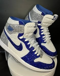 Step up your Jordans game with these fully blinged Jordan 1 High OG's or Jordan 1 Mids. I can do either shoe in this style. The mids are a bit more affordable.   These shoes are a great addition for prom, a birthday, a wedding, a night on the town, or your  next event! These shoes can be customized to the colors of your choosing. Not looking for Jordan 1's? Message me with your shoe choice. I'd love to create the custom shoe of your dreams. *Disclaimer We are not associated with the brand, I onl Silver High-top Sneakers With Bling, Jordan 1 Mids, Cute Casual Shoes, Casual Shoes Women Sneakers, Bedazzled Shoes, Sneaker Ball, Shoes Women Sneakers, Pretty Sneakers