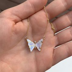 This handmade, butterfly necklace symbolizes your rebirth and the next chapter in your story. It's time to start something new and trust the magic of new beginnings. Embrace the beauty of your own transformation and let go of the past.DETAILS- One-of-a-kind butterfly- Crafted with 14k yellow solid gold- Natural, genuine moonstone- Diamond- Chain style may vary slightly- Handmade in New YorkIn natural stones, color variations and natural imperfections are common and make each stone rare and uniqu White Ethereal Jewelry For Gifts, White Delicate Jewelry Gift, Ethereal Handmade White Necklace, Handmade Ethereal White Necklace, Handmade White Ethereal Necklace, Unique Butterfly Charm Pendant Necklace, Unique Pendant Necklace With Butterfly Charm, Handmade Spiritual Butterfly Necklace, Spiritual Butterfly Charm Necklace As Gift