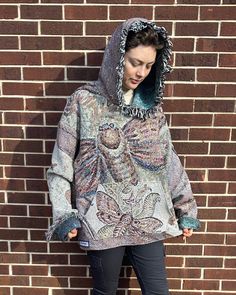 This is a one of a kind blanket / tapestry hoodie with my art. The fabric is woven 95% cotton and 5% poly blend to give the fabric a little more flexibility. Fabric is printed in America and the hoodies are stitched by me or a member of my shop. They are very high quality.  This one measures 25 inches across. Model is 5'9 and size 4/6 for reference. It fits like a large, but best to not have these tight! sleeves can be hemmed if requested! For longevity of the garment, it is best to spot clean/h Tapestry Fashion, Jacket Made From Blanket, Woven Tapestry Hoodie, Moth Jacket, Bleach Moth Hoodie, Tapestry Blanket Hoodie, Moth Blanket, Festival Mode, Tapestry Blanket