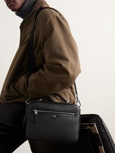 Dunhill's 'Contour' messenger bag has been made in Italy from leather that's quilted in the label's signature 'Rollagas' pattern. Designed with a front zipped pocket for your phone, it's sized to hold a tablet and comes with an adjustable webbing strap for a comfortable carry. Luxury Men's Shoulder Bag Satchel, Luxury Men's Crossbody Satchel, Luxury Large Capacity Men's Shoulder Bag, Luxury Men's Shoulder Bag With Detachable Strap, Men’s Messenger Bag, Leather Messenger Bag Men, Latest Bags, Black Leather Backpack, Woven Tote Bag