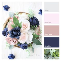 a basket filled with blue and pink flowers on top of a white wooden table next to greenery