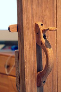 a close up of a wooden door handle