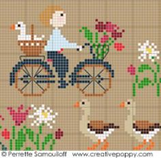 a cross stitch pattern with ducks and geese on a bike in front of some flowers