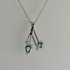 "14K White Gold Blue Topaz Diamond Accent Suite, earrings and necklace, pear shaped blue topaz matched color trillion blue, 5mm topaz ear studs, pendant with 5x7mm blue topaz, 18\" chain, 4 diamonds, 4 blue topaz total, Circa 1990, 4.5 grams Stock # BB238CPOC30 Most rings are sizable for a small fee. If the ring you are considering is the incorrect size contact us for a quote. This listing contains photographs of the actual item you will receive. Our items are in excellent condition with little Blue Topaz Teardrop Necklace For Formal Occasions, Formal Blue Topaz Teardrop Pendant Necklace, Pear-shaped Blue Topaz Jewelry For Anniversary, Formal Blue Topaz Teardrop Necklace, Formal Teardrop Blue Topaz Necklace, Blue Topaz Teardrop Pendant Jewelry For Anniversary, Blue Topaz Teardrop Pendant For Anniversary, Drop Shaped Topaz Jewelry For Anniversary, Drop Shape Topaz Jewelry For Anniversary