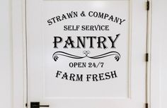 a white door with a sign on it that says, straw & company self service pantry open 24 / 7 farm fresh