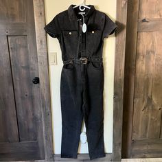 Cloud Ten Black Denim Jumpsuit, Womens Size S. Brand New With The Tags! Has Pockets, Gold Hardware, And The Cutest Western Style Belt (Thats Also Removable). Behind The Neck You Can See Threads From Where The Tag Is Attached, But You Can Remove It! Chic Black Denim Jumpsuit, Black High Rise Denim Jumpsuit For Spring, Fitted Denim Jumpsuits And Rompers In Black, Fitted Black Denim Jumpsuits And Rompers, Fitted Black Denim Jumpsuit With Pockets, High Waist Black Denim Jumpsuits And Rompers, Black High Rise Fitted Denim Jumpsuit, Fitted Black Overall Jeans, Black High-rise Fitted Denim Jumpsuit