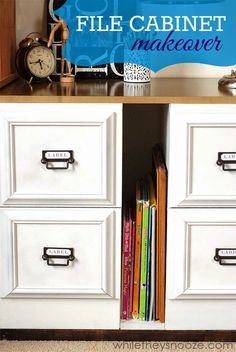 a white cabinet with drawers filled with books