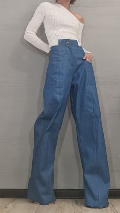 Extravagant Denim Pants, Asymmetric Denim Pants, Streetwear Pants, Deconstructed Denim, Women Denim Harem ❤️ Extravagant designs and high quality fabrics! ❤️ Materials & Care Denim Hand wash at low temperatures. Do not machine dry. Do not iron. Do not dry clean! ❤️ Sizing We can make your piece from XS to 5XL! Everything in the shop can be also made according to your measures free of charge! ❤️ Shipping ✈ Ready to ship The time I need to prepare an order for shipping varies. For details, see ind Denim Blue Wide Leg Jeans With Belt Loops, High Waist Fitted Denim Blue Pants, Fitted High Waist Denim Blue Pants, Stretch Denim Blue Trousers, Fitted Wide Leg Cropped Jeans, Baggy Dark Wash Pants For Work, High Rise Loose Fit Denim Flare Jeans, Stretch High-waisted Denim Blue Pants, Full Length Medium Wash Bottoms For Work