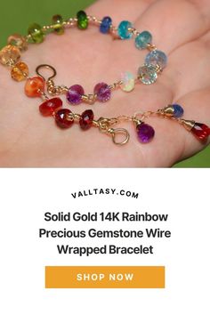 This 14K Solid Gold bracelet features breathtakingly gorgeous precious gemstones in a rainbow color palette. Here I have gathered the most stunning, clear, sparkling AAA quality rondelles faceted and smooth, larger and smaller, and wire wrapped each one separately with a wide Solid Gold 14K wire. As a combination they create a fantastic ombre gradation that shines from across the room. 14k Gold Multicolor Gemstone Jewelry, Multicolor 14k Gold Jewelry With Gemstone Accents, Multicolor Multi-stone 14k Gold Bracelets, 14k Gold Multicolor Jubilee Bracelet Jewelry, Multicolor 14k Gold Jubilee Bracelet, Multicolor 14k Gold Bracelet, 14k Gold Multi-stone Rainbow Jewelry, 14k Gold Rainbow Multi-stone Jewelry, Rainbow Multi-stone 14k Gold Jewelry