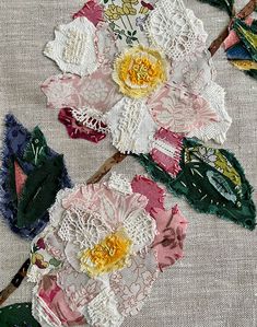 several pieces of fabric with flowers on them