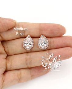 "~Earrings (see pic 1, 3-5) These Zirconia stud earrings will look elegant and beautiful quality on any modern, classic or vintage inspired bride! It's so fashionable and comfortable! All components are high quality platinum plated (Anti tarnish). Have a long lasting color and are hypoallergenic. Finish: Silver Platinum or Rose gold plated components Size: M. Teardrop 16mm x 10mm (See pic.4) Material: AAA Zirconia, Rhinestones, Rose gold plated Quantity: 1 pair Weight: 6g Items Condition: 100% B Wedding Bridal Earrings In Rose Gold With Halo Design, Rose Gold Cubic Zirconia Jewelry For Wedding, Rose Gold Halo Bridal Earrings For Wedding, Gold Cubic Zirconia Bridal Accessories For Gift, Gold Cubic Zirconia Bridal Accessories As Gift, Gold Cubic Zirconia Bridal Earrings For Bridesmaids, Rose Gold Cubic Zirconia Bridal Earrings For Formal Events, Rose Gold Cubic Zirconia Bridal Earrings For Formal Occasions, Formal Rose Gold Bridal Earrings With Cubic Zirconia