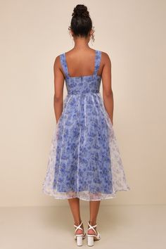 A cutie like you will have no problem turning on the charm when you're wearing the Lulus Delightful Impulse Blue Floral Organza Bustier Midi Dress! Lightweight woven organza (with a tonal floral print throughout) shapes wide straps and a bustier-style bodice with a sweetheart neckline, seamed cups, and hidden side boning. Fitted waist tops a lightly gathered midi skirt with a flaring, twirl-ready silhouette. Hidden zipper/clasp at back. Fit: This garment fits true to size. Length: Mid-calf lengt Summer Blue Dress With Boned Bodice, Fitted Light Blue Organza Dress, Light Blue Fitted Organza Dress, Blue Sheer Bodice Dress For Spring, Blue Spring Dress With Sheer Bodice, Spring Blue Dress With Sheer Bodice, Spring Organza Dress With Boned Bodice, Blue Sleeveless Organza Dress, Blue Organza Sleeveless Dress