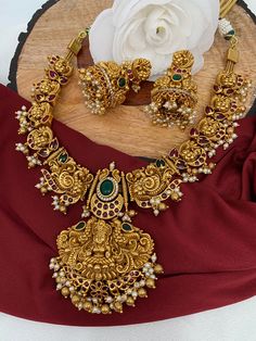 Goddess Lakshmi Peacock Nakshi Pota Stone Short Necklace Necklace Length : 16 Inches; Earring Length : 2 inches; Earring Weight : 29 grams Each Nakshi Necklace, Pearl Neck, Necklace Traditional, Gold Temple Jewellery, Antique Necklaces Design, Beautiful Chokers, Temple Jewelry, Bride Jewelry, Gold Bride Jewelry