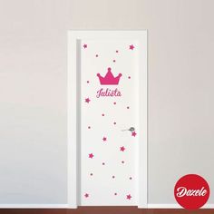 the door is decorated with pink stars and a princess crown on it's side