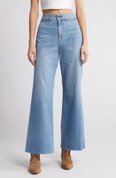 Add a retro vibe in wide-legged jeans finished with unfinished hems and cut from stretch-kissed Japanese denim. 30" inseam; 22" leg opening; 12 1/2" front rise; 15" back rise (size 29) Zip fly with button closure Front welt pockets 98% cotton, 2% polyurethane Machine wash, line dry Made in the USA of imported fabric Wide Legged Jeans, Japanese Denim, Retro Vibe, Welt Pockets, Wide Leg Jeans, Brighton, Leg Jeans, High Waist, Wide Leg