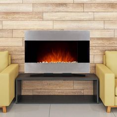 a living room with two yellow chairs and a fireplace in the center that is lit