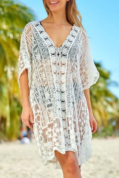 White Floret Trim V Neck Sheer Lace Beach Dress White V-neck Breezy Cover-up, White V-neck Dress For Resort, White V-neck Resort Dress, Casual White Resort Dress, Bohemian White Dress For Resort Season, White Short Sleeve Beach Dress For Vacation, White Bohemian Dress For Resort Season, White Resort Season Vacation Dress, White Tunic Cover-up For Vacation