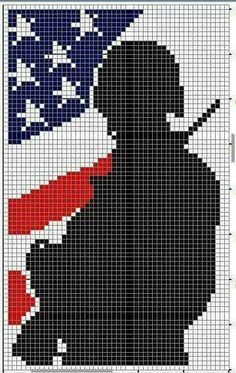 a cross stitch pattern with the silhouette of a man holding an american flag in his hand